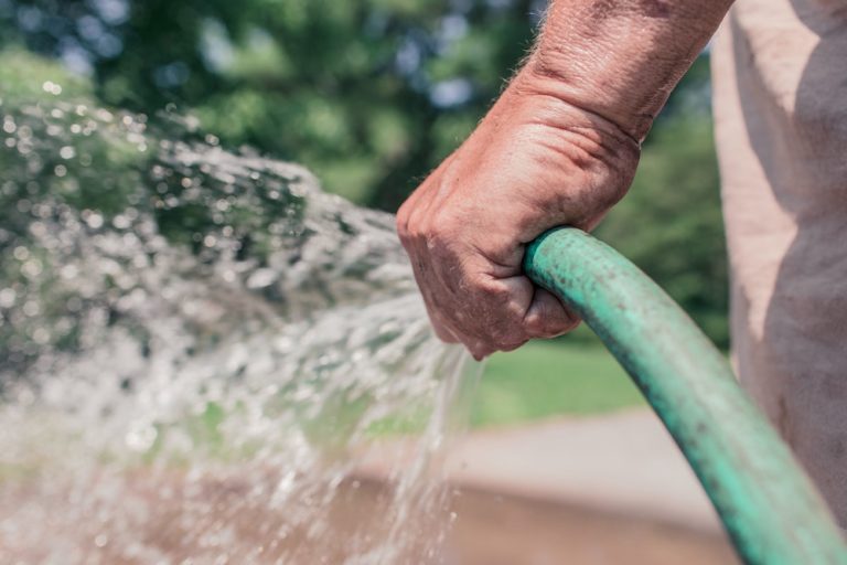 Hosepipe water spraying out