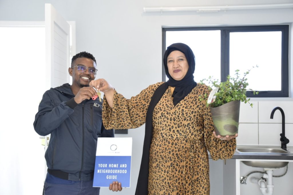 Happy Client receiving keys to move in